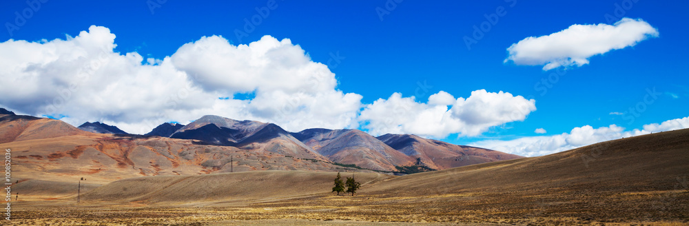 Prairie landscape with mountains panorama