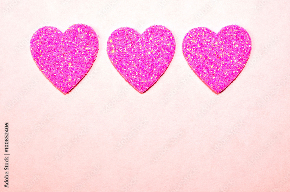 Glittering sparkling twinkling pink hearts.  Valentine's Day, Wedding, Anniversary, symbol of Love.