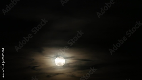 Transition from day through night. Fast moving clouds to star filled night sky photo