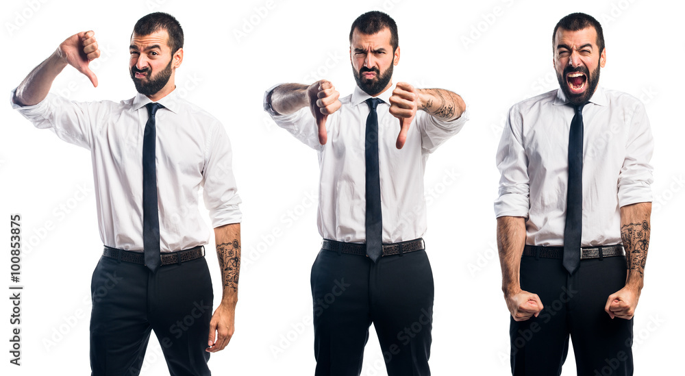 Businessman doing bad signal Businessman doing bad signal