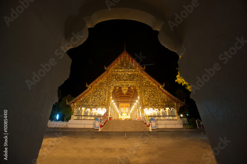 Night scene Wiharn of Wat Suan Dok temple in Chiang Mai city. photo