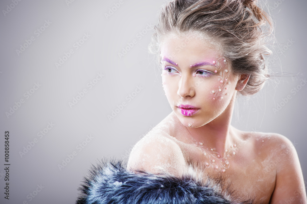 Portrait a beautiful woman with winter makeup Portrait a beautiful woman with winter makeup