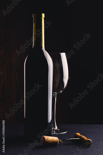 Bild auf Leinwand Full bottle of wine, empty glass and corkscrew