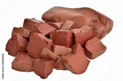 a pork blood pudding on white background