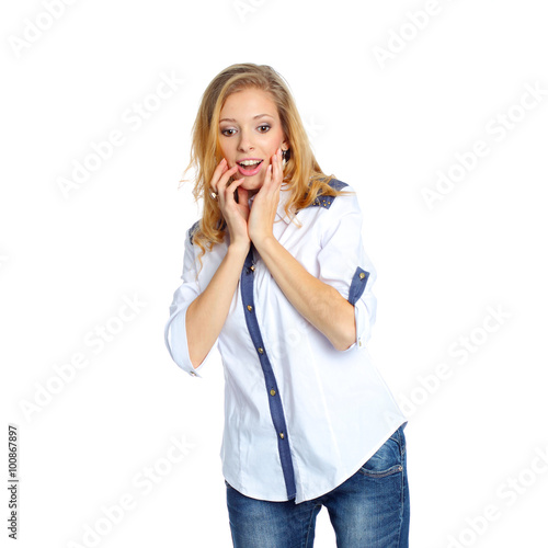 Emotional girl looks down and is surprised