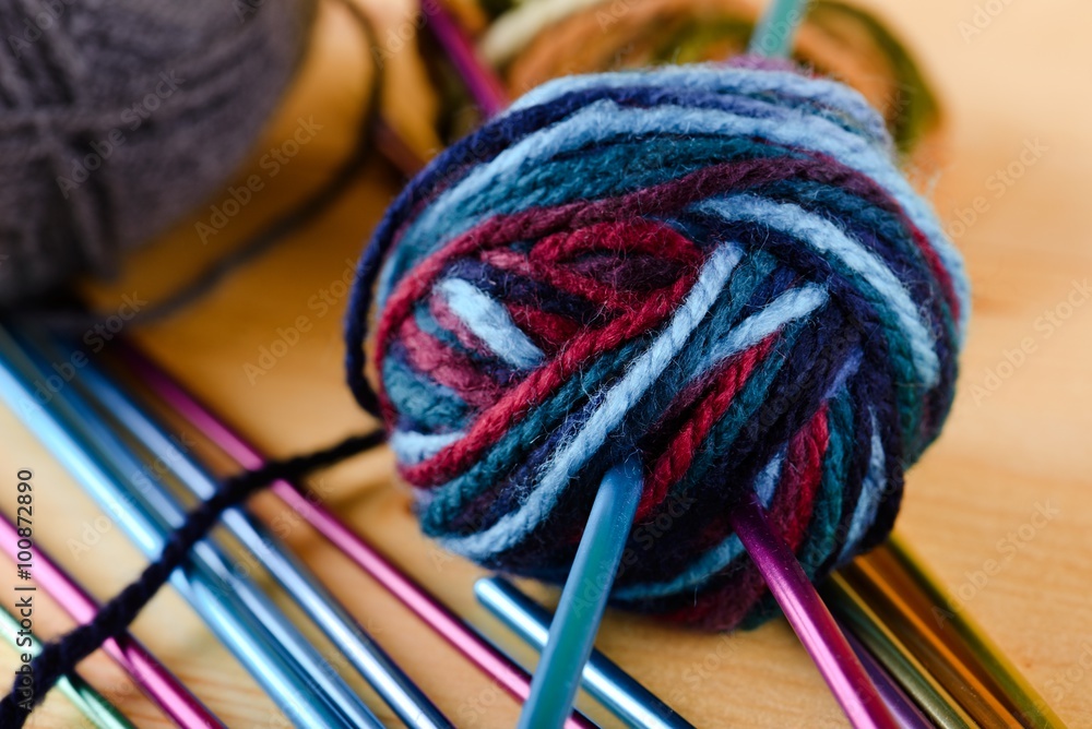 Ball of wool with knitting needles