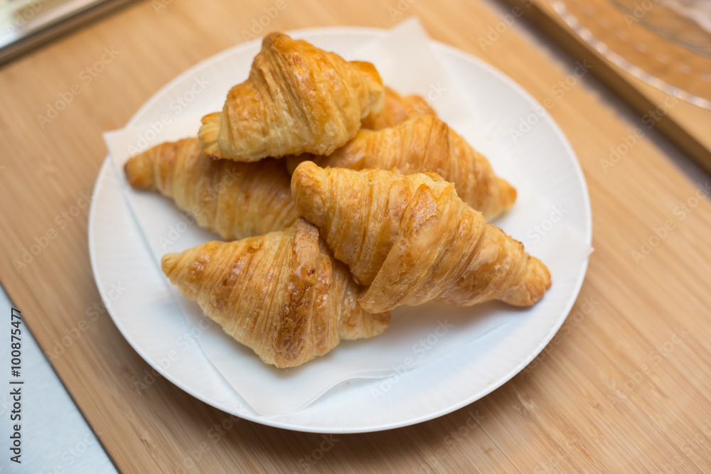 croissant bread on buffet line