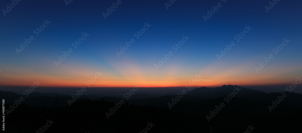 Panorama of colorful sky above mountain just before sunrise - obrazy, fototapety, plakaty 