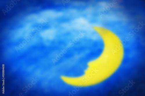 Blurred scene of sleeping moon on white cloud with night sky bac
