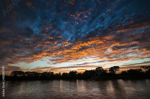 sunset on the Cuiaba river in the Pantanal in Brazil