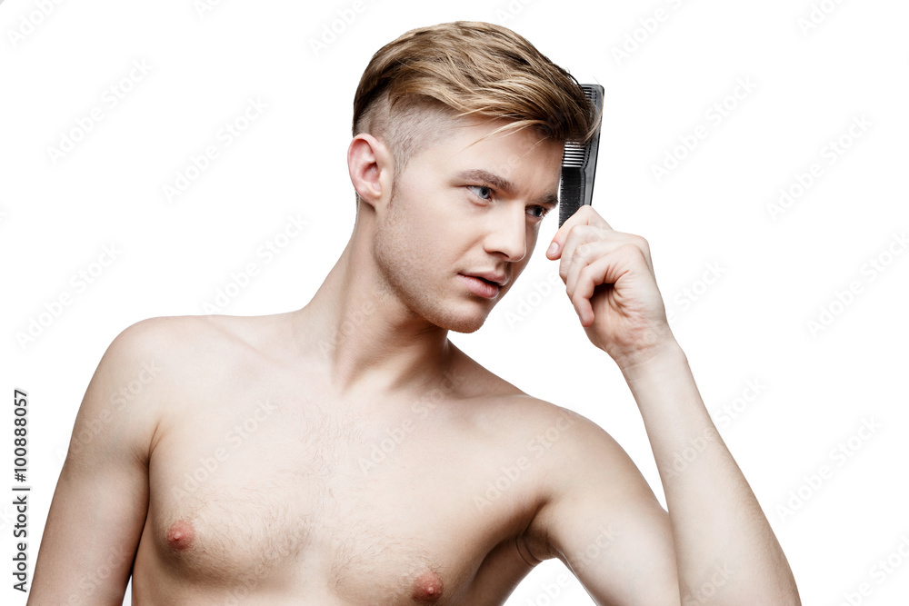 Obraz premium Young shirtless man isolated on white