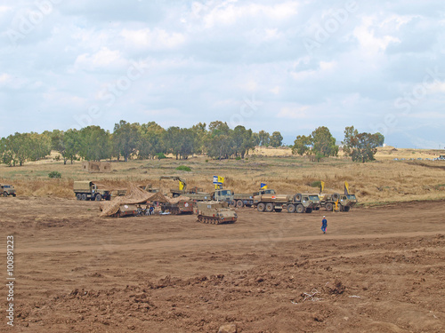 Merkava tanks and Israeli soldiers in training armored forces