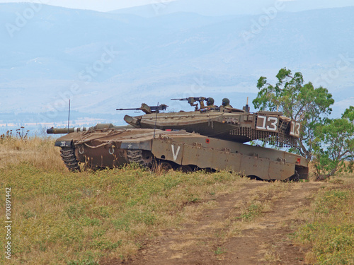 Merkava tanks and Israeli soldiers in training armored forces photo