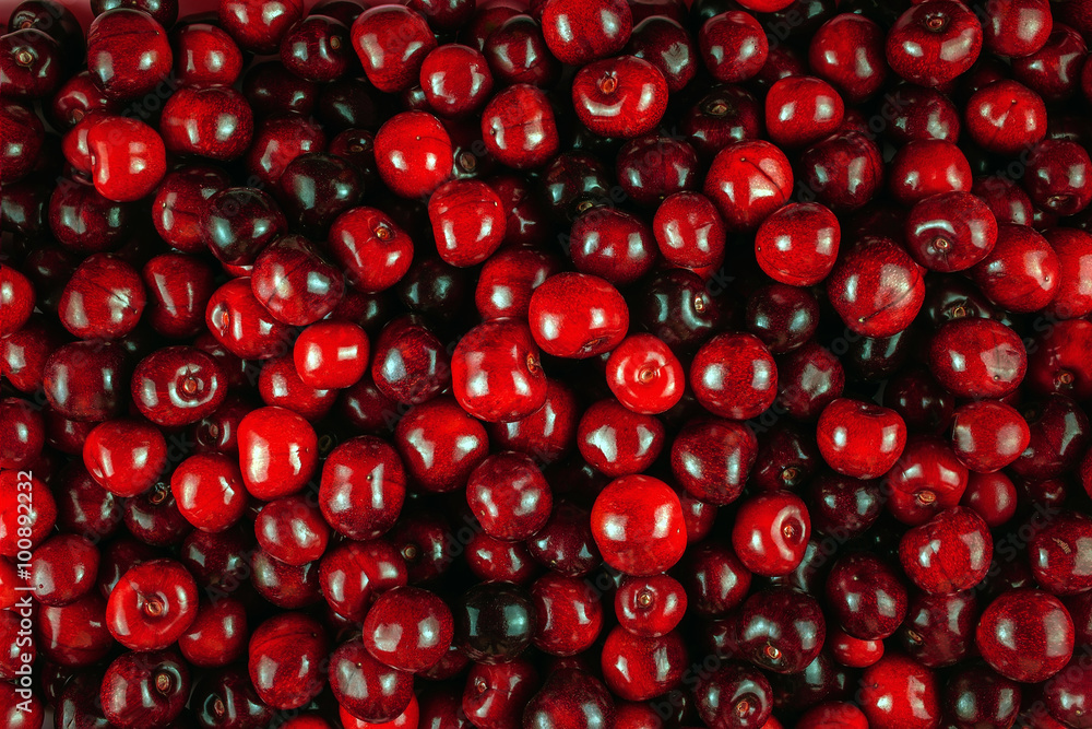 background filled with juicy red  berries. Cherry, cherries