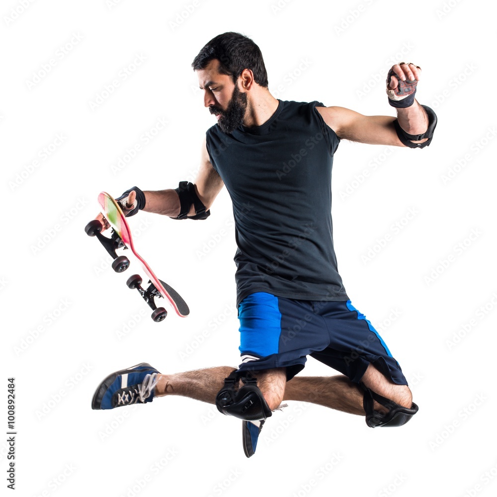 Fototapeta Man with skateboard jumping