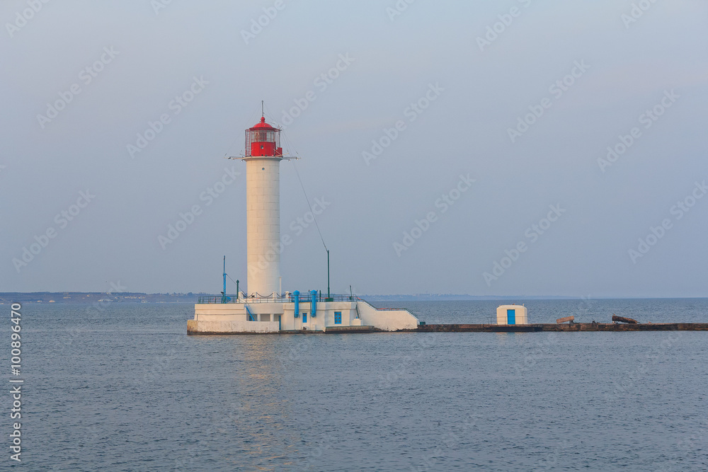 White lighthouse, the sea and coastline. Odessa, Ukraine
