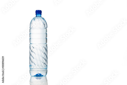 Single refreshing mineral water in plastic bottle in white background