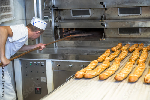 baker removing the oven a delicious crispy golden wand