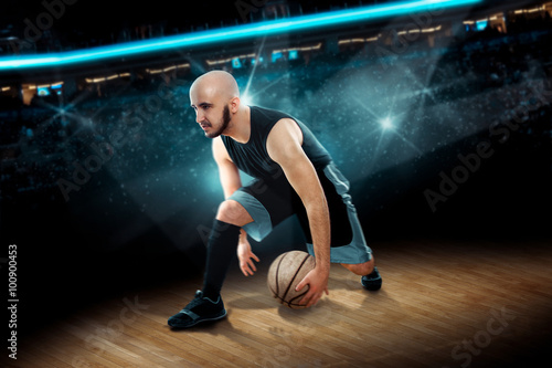 man in basketball action game dribbles