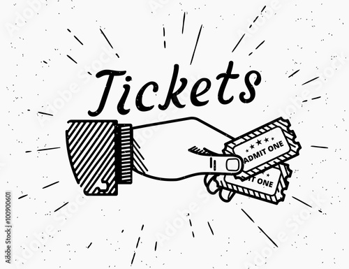 Retro grunge illustration of human hand with two tickets photo