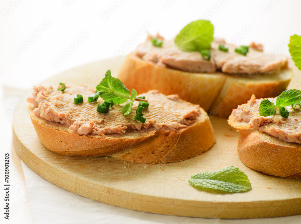 Sandwiches with paste and green onions.