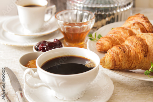Fototapeta Naklejka Na Ścianę i Meble -  French light breakfast of coffee and croissants