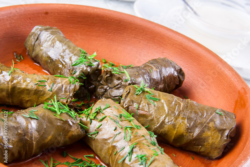Traditional Armenian dolma (tolma) - stuffed with meat in grape leaves photo