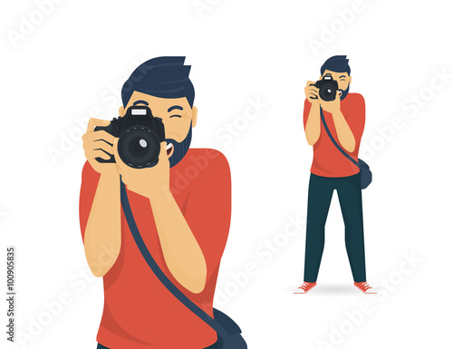 Happy photographer is taking a photo