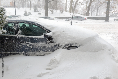 Snow covered car on street in New York after winter snowstorm  Manhattan