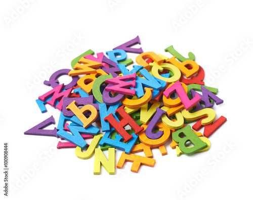 Pile of colorful wooden letters isolated