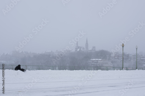 Washington DC disappearing in to the haze of snow from Francis Scott Key Bridge