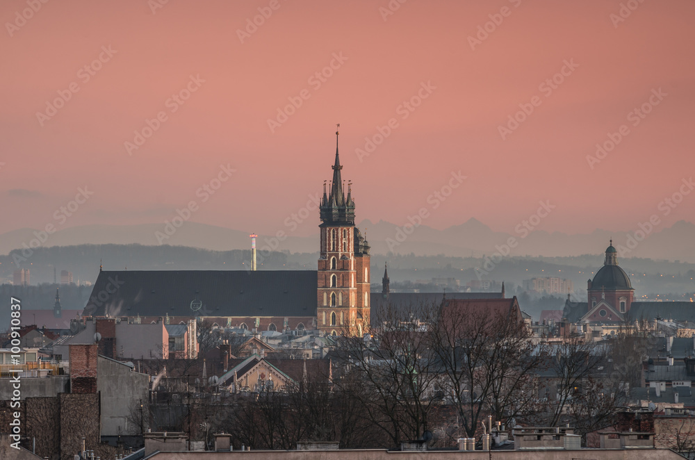 Krakow, Poland, St Mary's church over old town in the evening