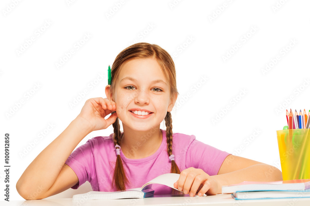 Funny schoolgirl with pencil behind her ear Funny schoolgirl with pencil behind her ear