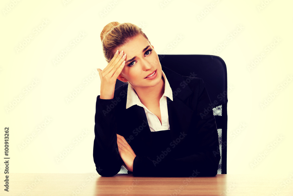 Beautiful businesswoman having huge headache Beautiful businesswoman having huge headache
