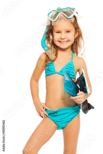 Canvas Print A girl in swimwear with flippers and diving mask