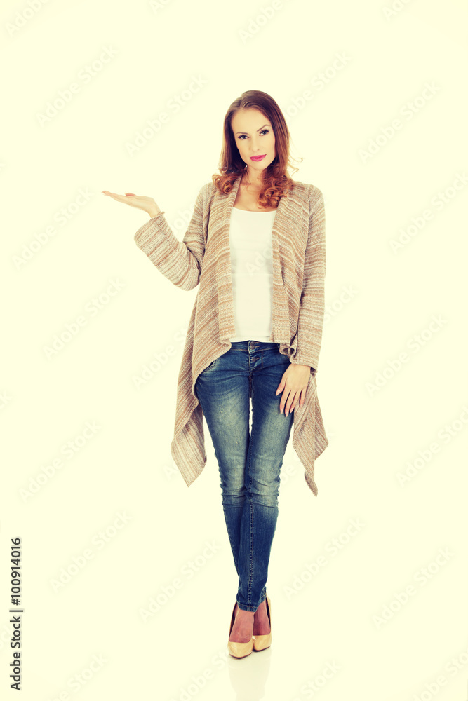 Beautiful woman showing empty hand. Beautiful woman showing empty hand.