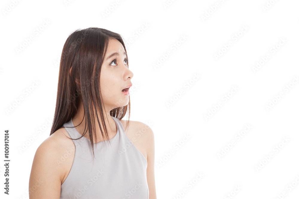 Beautiful young Asian woman shocked and look up Beautiful young Asian woman shocked and look up