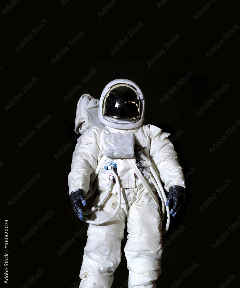 Astronaut against a black background