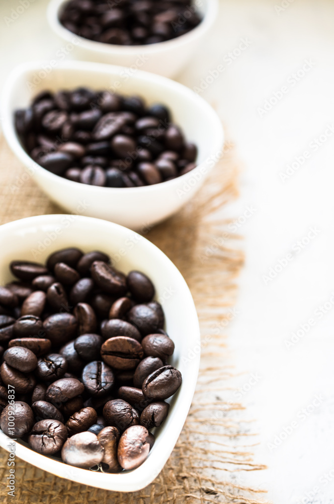 Coffee beans on rustic background Coffee beans on rustic background
