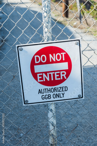 Do not Enter sign on steel fence