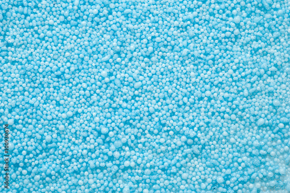 Macro shot of pellets of colored modelling wax