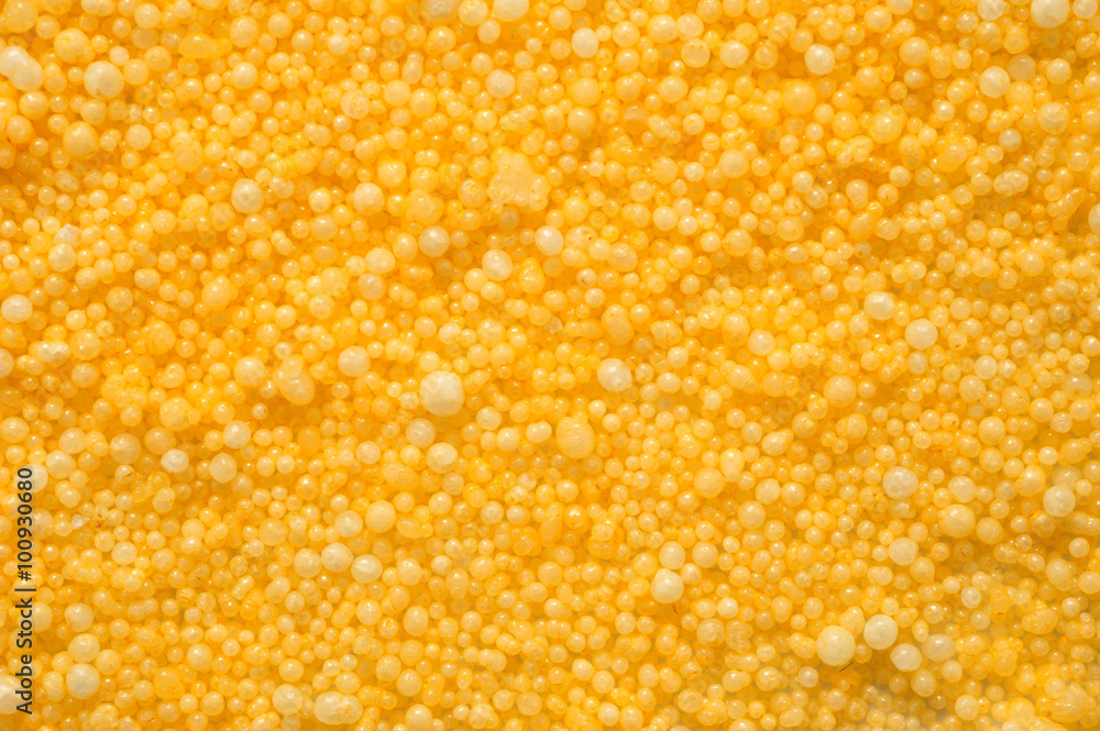 Macro shot of pellets of colored modelling wax