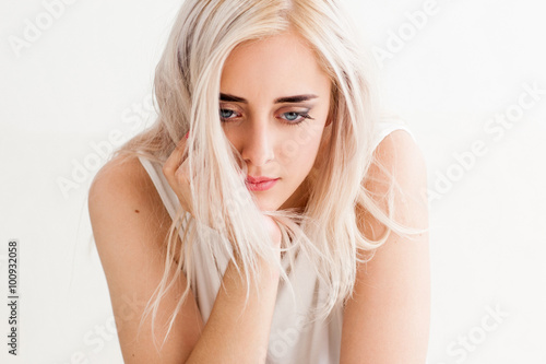 Sad  lonely woman looking down in disappointment