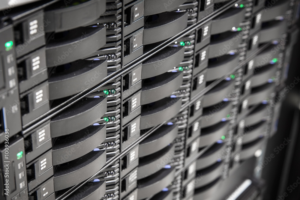 Close up of hard drives in large SAN storage Close up of hard drives in large SAN storage