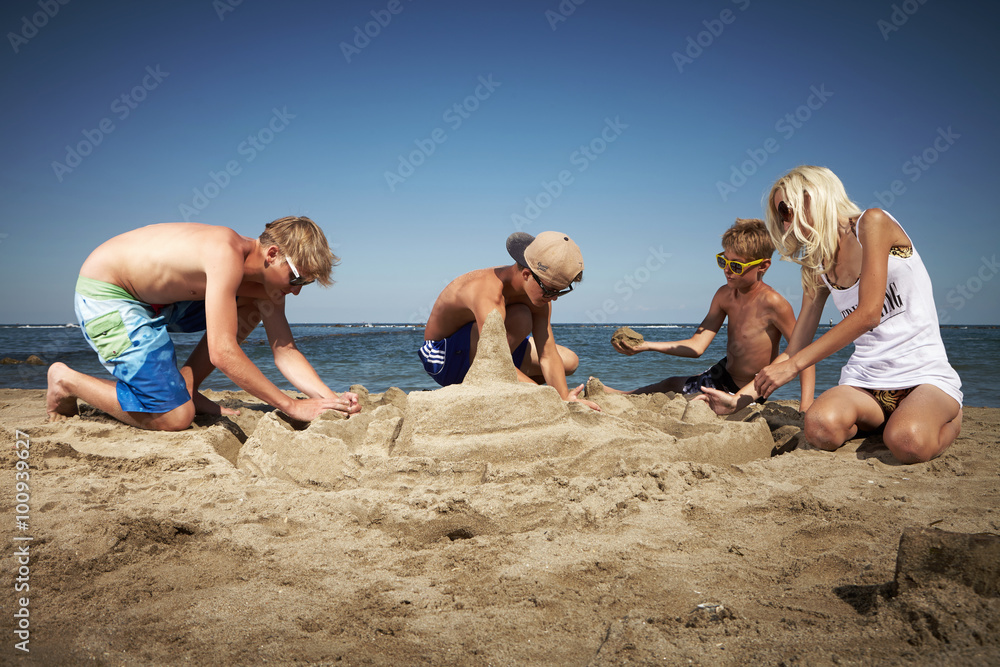 Summer building of sand castle Summer building of sand castle