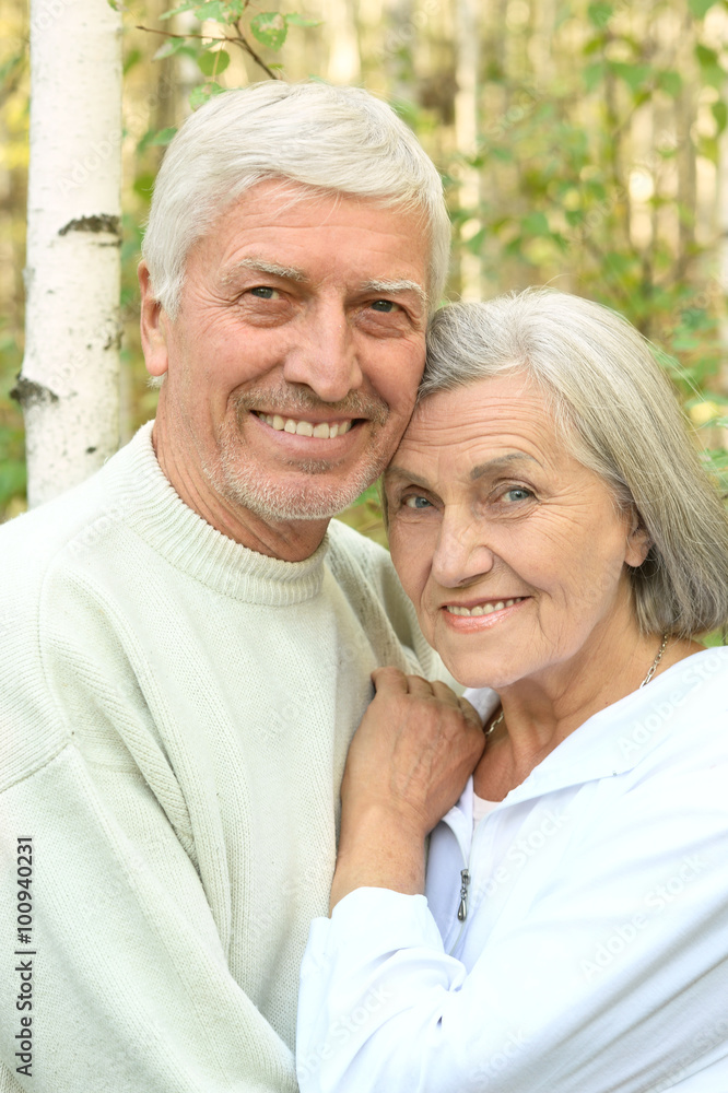mature couple on in summer park mature couple on in summer park