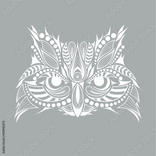 Patterned  head of an owl. African / indian / totem / tattoo design. It may be used for design of a t-shirt, bag, postcard and poster.