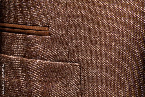 Row of buttons on the sleeve of a tailor made suite