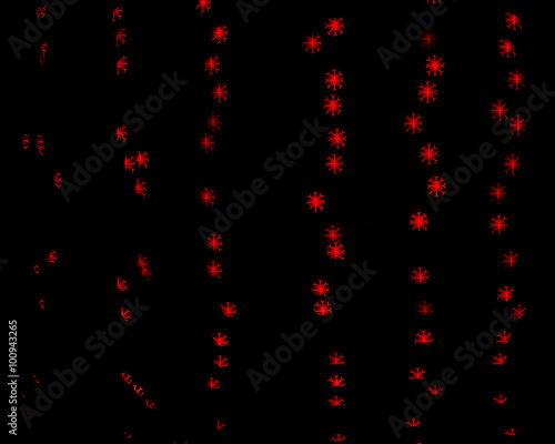 red bokeh background snowflakes