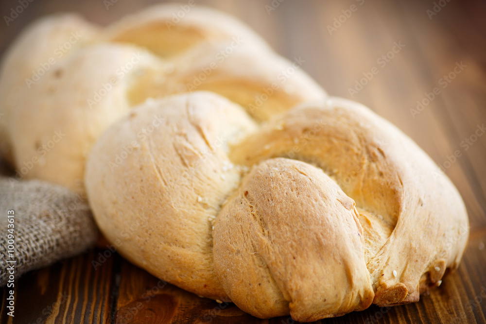 Naklejka premium bread in the form of braids